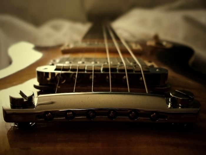 cropped-guitar-strings-pov-bridge1.jpg